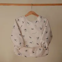 Mushie Babero con mangas